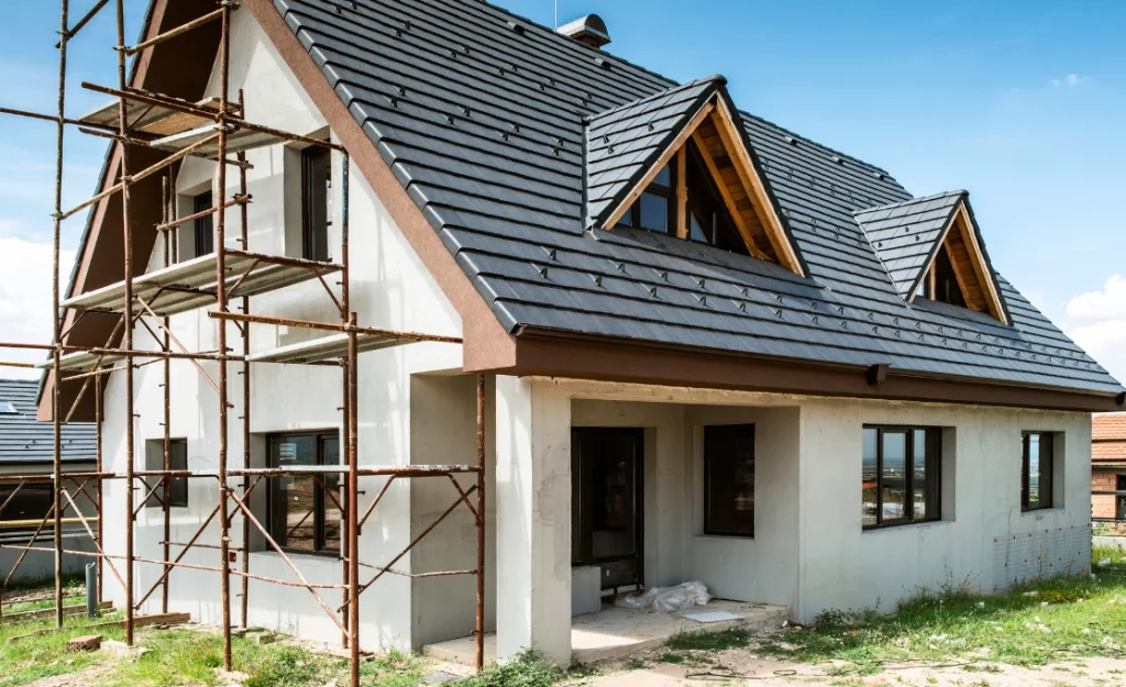 Scaffolding on the attic of a house during renovation. Horsham loft conversion