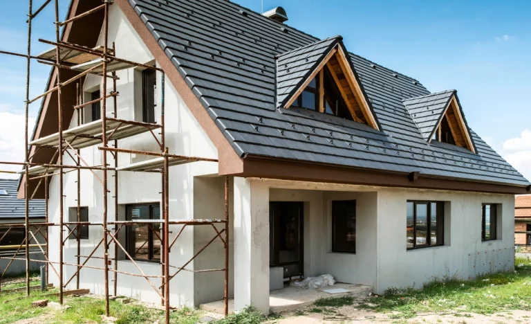 Scaffolding on the attic of a house during renovation. Horsham loft conversion